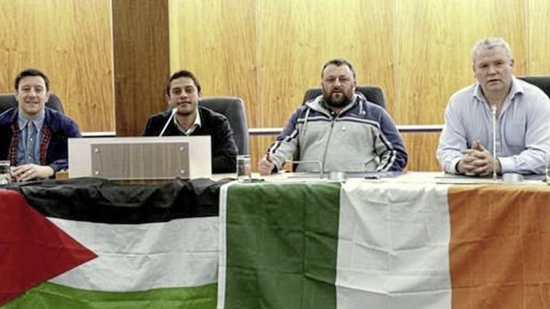 Padraig McShane, right, at the Coleraine headquarters of Causeway Coast and Glens Borough Council with Derry councillors Gary Donnelly and Darren O&#39;Reilly and visiting Gaza official Mohamed Al-Halabi. 