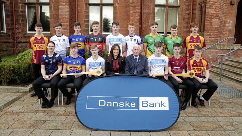 2017/18 Danske Bank Ulster Schools All Stars Awards Aisling Press, Head of Branch Banking at Danske Bank and Jimmy Smith, Chairman of the Ulster Schools GAA. pictured with the Hurling All Stars. Photo by  Kelvin Boyes / Press Eye