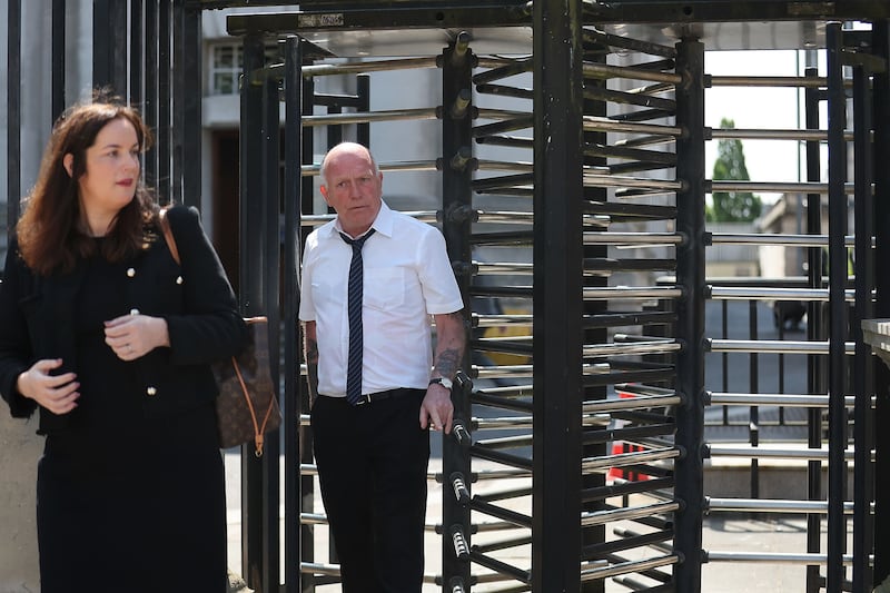 Claire McKeegan and Gary Hoy outside the High Court in Belfast. Picture by Hugh Russell