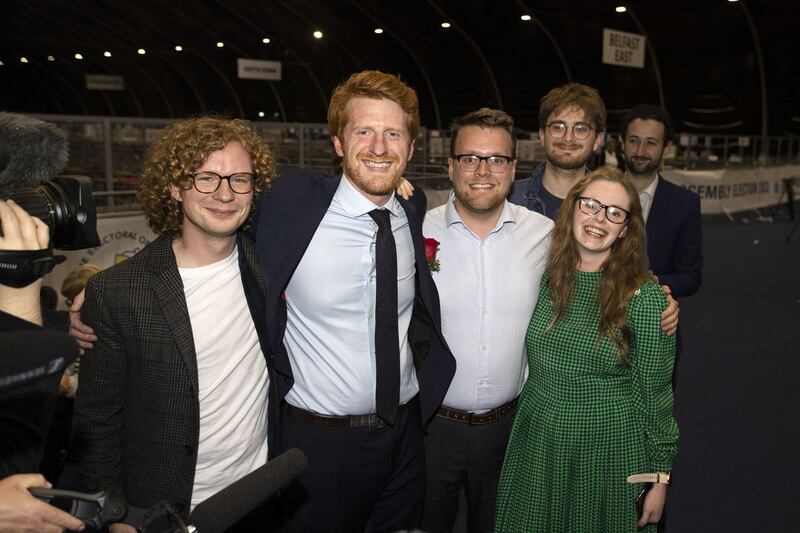 The SDLP's Matthew O'Toole (second left) celebrates with his election team after being newly elected as an MLA at the Titanic Exhibition Centre during the count for the Northern Ireland Assembly Election. Picture by Liam McBurney/PA Wire&nbsp;