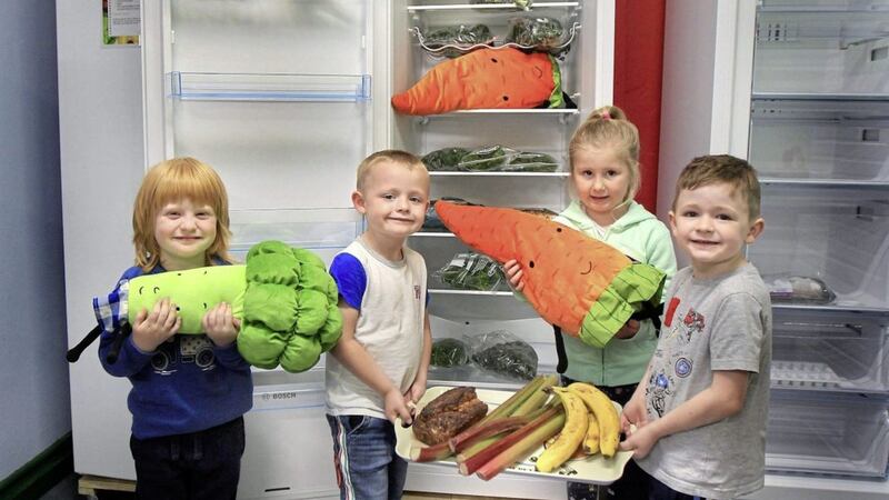 Rowan Donnelly, Oisin McCaughan, Khyia Douds and Jamie Goligher helping launch the new Cloughmills Community Fridge project. Picture by Margaret McLaughlin 