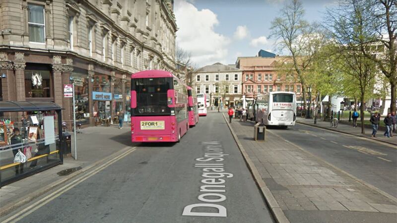 The woman was pushed to the ground on Donegall Square West in Belfast on Friday afternoon&nbsp;