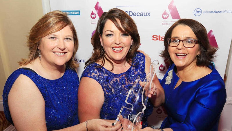 Tina McKenzie (centre) of Staffline Group Ireland pictured at the Women in Business Awards with the Roseann Kelly (WIB) and Jackie Henry (Deloitte) 