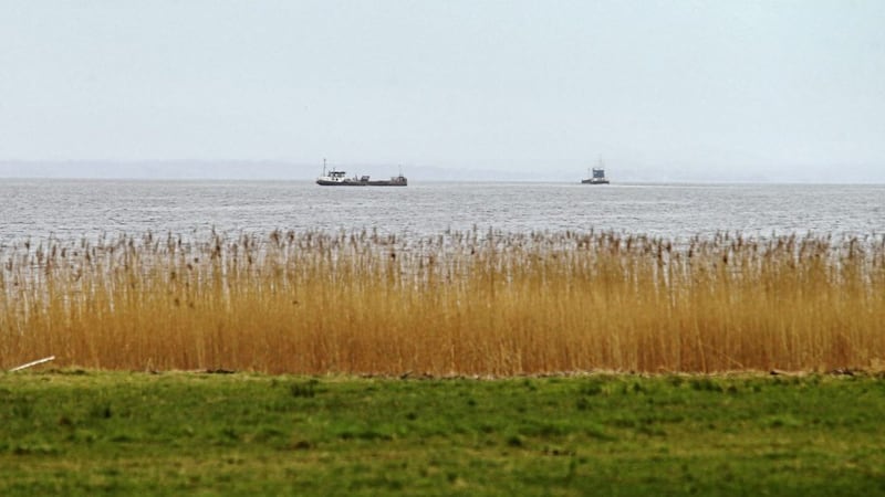 Boats dredging sand on Lough Neagh. Picture by Mal McCann. 