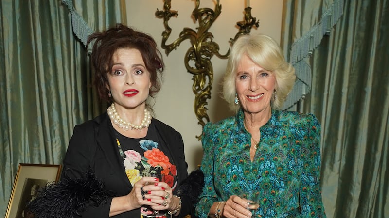 Camilla (right) and Helena Bonham Carter had a lengthy chat at the reception (Yui Mok/PA)