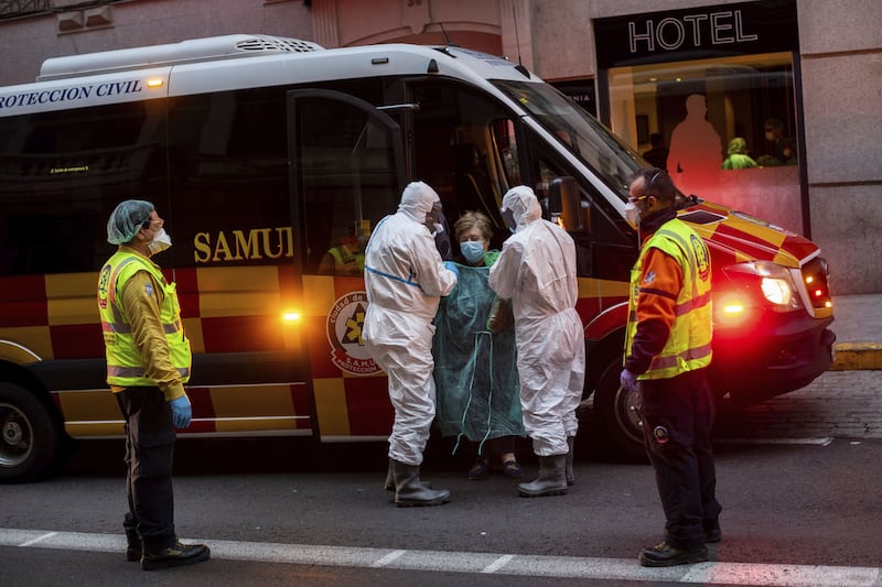 A patient being transferred to a medicalised hotel during the COVID-19 outbreak in Madrid, Spain. Picture by Bernat Armangue/AP&nbsp;