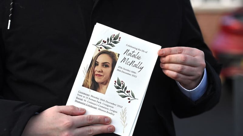 A mourner holds a order of service during the funeral of murder victim Natalie McNally at her parents home in Lurgan in County Armagh, Northern Ireland. (PA)