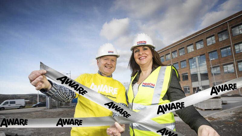 Tom McEneaney of AWARE with Caroline Hughes from Heron Brothers, who is speaking at the upcoming conference and sharing her experience of engaging with the charity to breakdown the stigma associated with mental illness in the workplace 