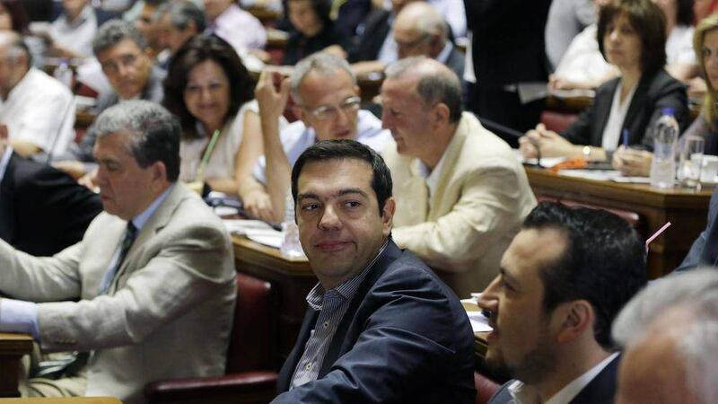 Greece&#39;s Prime Minister Alexis Tsipras attends a meeting with lawmakers of Syriza party at the Greek Parliament in Athens 