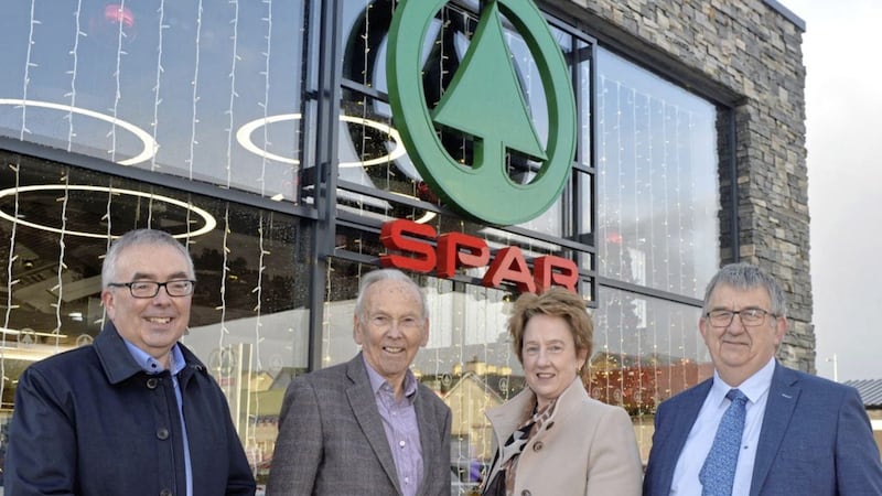 Ruth and Charlie Hamilton (right) with Henderson Group chairman John Agnew and joint managing director Martin Agnew at the opening of Hamilton&rsquo;s Spar Castlederg after its recent renovation 