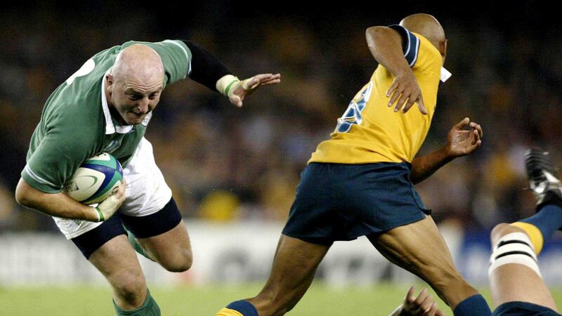 Legendary Ireland rugby captain Keith Wood swerves past Aussie skipper George Gregan during their final Rugby World Cup pool game in Melbourne, Australia Saturday Nov. 1 2003. Australia defeated Ireland by a single point, 17-16, to win their Pool