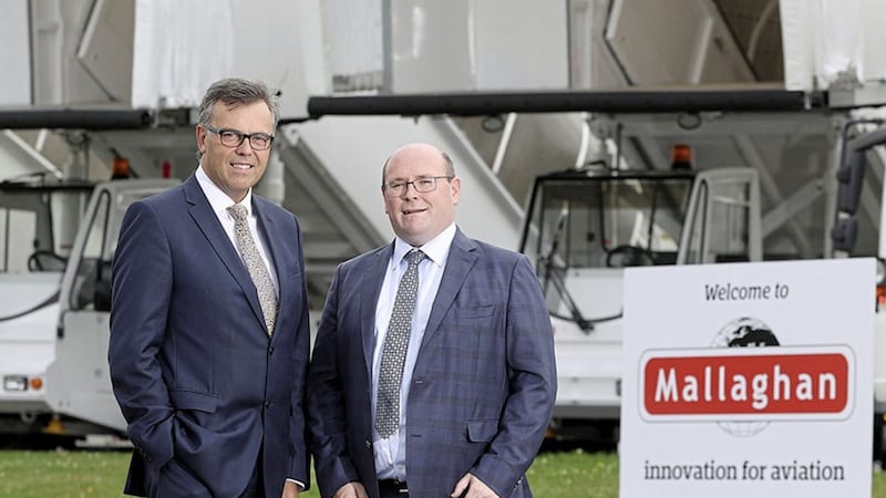 Mallaghan chief executive Ronan Mallaghan (right) with Invest NI chief executive Alastair Hamilton at an announcement last year of a multi-million pound investment by the Dungannon company 