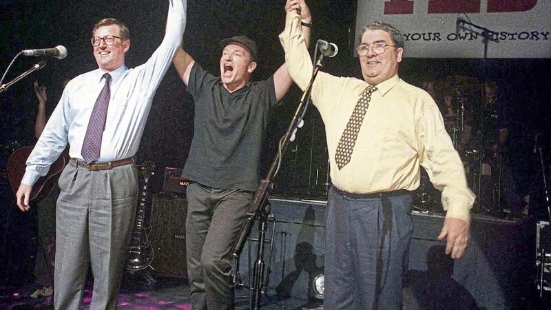David Trimble and John Hume pictured with Bono at the Concert for Yes in 1998. Picture by Paul Faith 