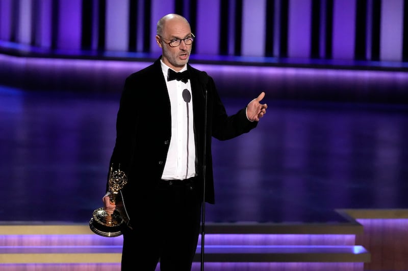 Jesse Armstrong accepts the award for outstanding writing for a drama series for Succession during the 75th Primetime Emmy Awards (AP/Chris Pizzello)
