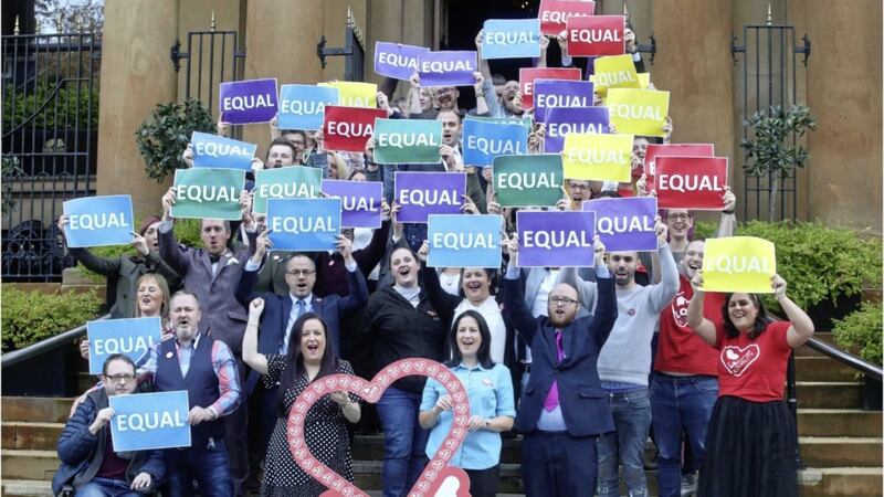 Same-sex marriage campaigners gathered on Monday to celebrate the law change. Picture by Hugh Russell 