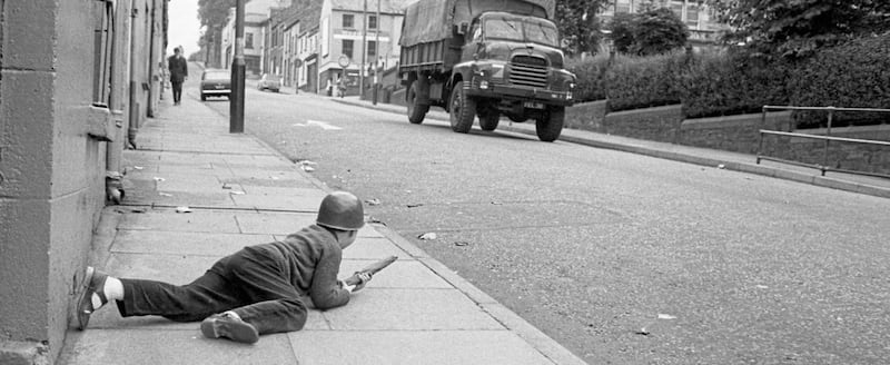 Children&#39;s war games at Creggan Street, oppostite St Eugene&#39;s Cathedral reflected the deadly reality of life in Derry in April and May 1972. Picture by G&eacute;rard Harlay 
