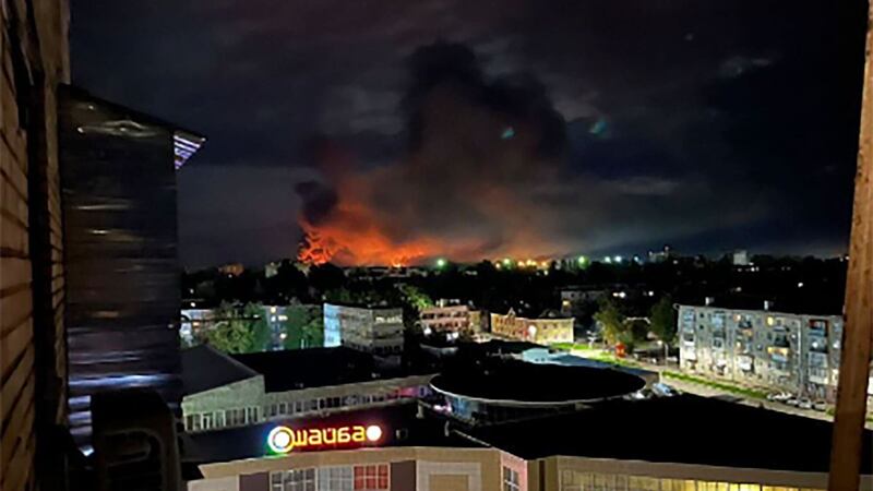 Smoke billows over the city and a large blaze in Pskov, Russia after what appeared to be the biggest drone attack on Russian soil since Moscow sent troops into Ukraine 18 months ago. (Ostorozhno Novosti via AP)