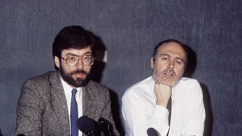 Sinn F&eacute;in president Gerry Adams and director of publicity Danny Morrison speak to journalists in west Belfast in October 1988, as British Home Secretary Douglas Hurd imposed a broadcast ban on proscribed organisations. Picture by Pacemaker. 