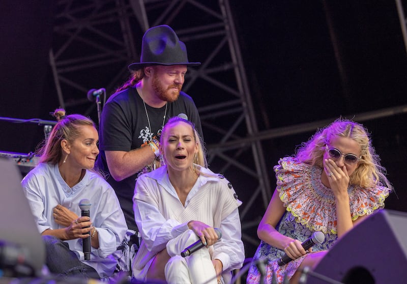 Keith Lemon, aka Leigh Francis, on stage with Louise Redknapp, Kimberly Wyatt and Pixie Lott during the Flackstock festival