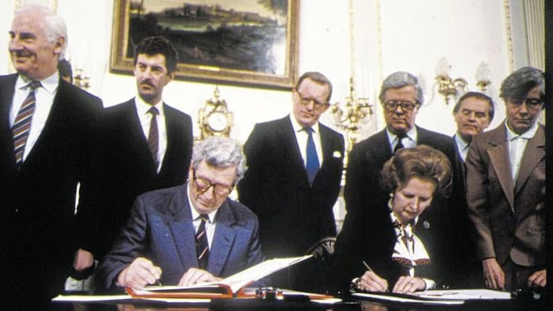 Margaret Thatcher and Garret FitzGerald sign the Anglo-Irish Agreement at Hillsborough Castle in 1985. Photo: Pacemaker Press Intl. 