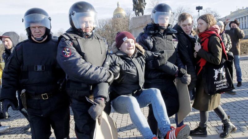 ANGER: Russian police detain a protester during a single picket protest against constitutional changes near the Constitutional Court building in St Petersburg, Russia, on Sunday 							  Picture: Dmitri Lovetsky/AP 