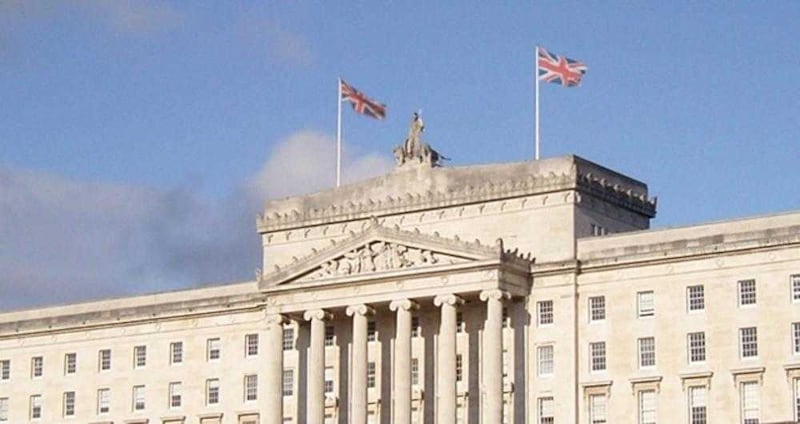 Two Union flags fly over Parliament Buildings at Stormont 