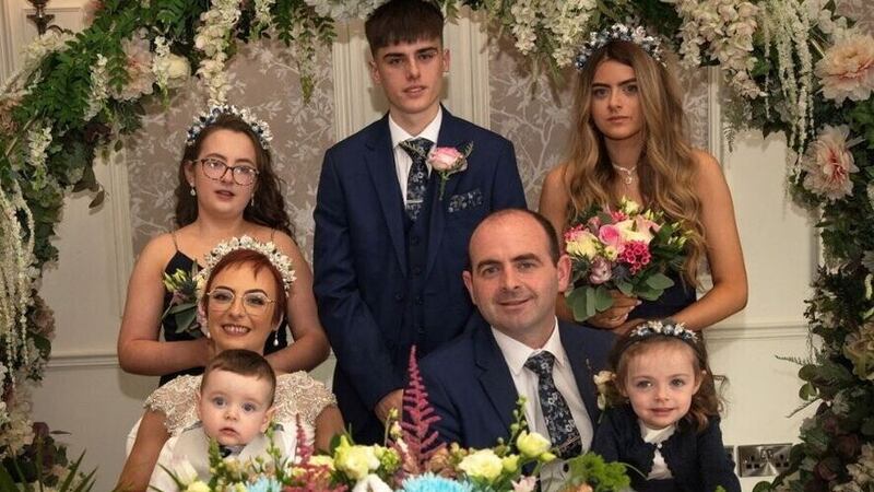 Danielle Collins, nee Donnelly, and Darren Collins celebrated their wedding along with their five children Kayla (12) , Edward (17), Shanice (14), Jamie (one) and Tianna (three). Picture, Donna Logue..