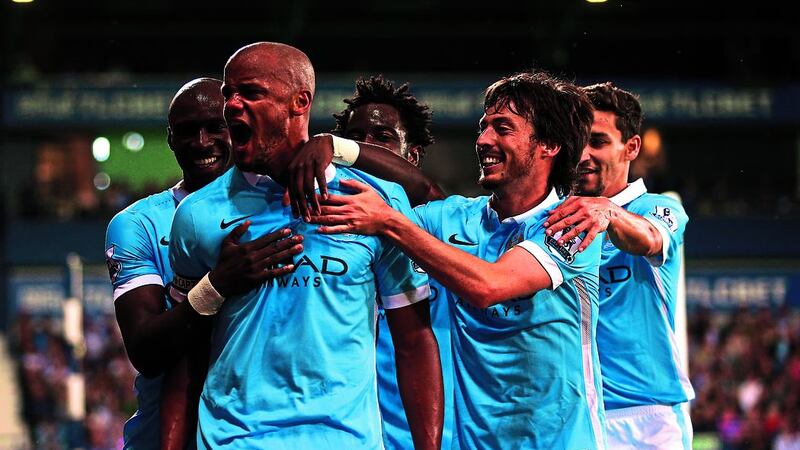 &nbsp;Manchester City's Vincent Kompany (second left) celebrates scoring.&nbsp;