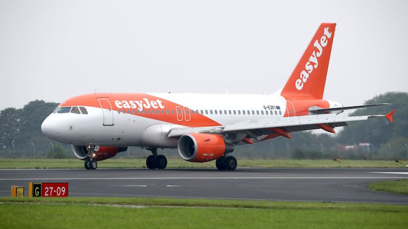 EasyJet says it will take a hit of more than &pound;200 million from the plunging pound and in the wake of terrorist attacks and air traffic control strikes 