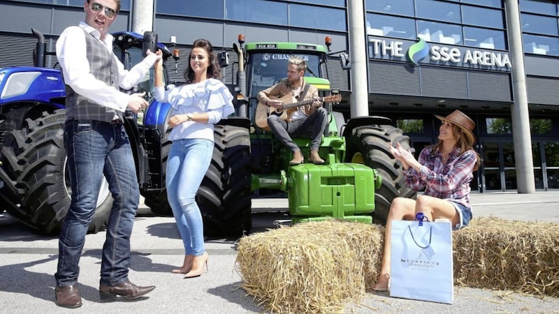 Country music stars Derek Ryan and Lisa McHugh, together with jiving enthusiast Ruairi McSorley at the launch of the first ever Farmer&#39;s Bash at Belfast&#39;s SSE Arena on October 6. Picture by Mal McCann 