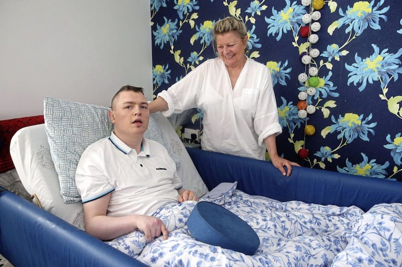 Jean Kelly with her son Deaglan, who suffers from a severe form of epilepsy. Picture by Mal McCann. 