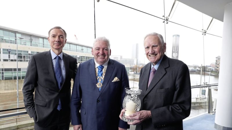 Chartered Accountants Ireland president Feargal McCormack (centre) and chief executive Barry Dempsey mark Sir Desmond Lorimer&rsquo;s contribution to the profession and public life with the presentation of Galway Crystal at an event at Belfast ICC 
