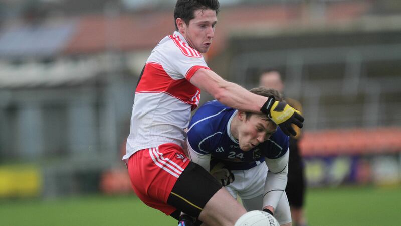 Cavan's Gear&oacute;id McKiernan is manhandled by Derry's Emmet Bradley during Sunday's Dr McKenna Cup semi-finals at the Athletic Grounds on Sunday<br/>Picture by Colm O'Reilly&nbsp;