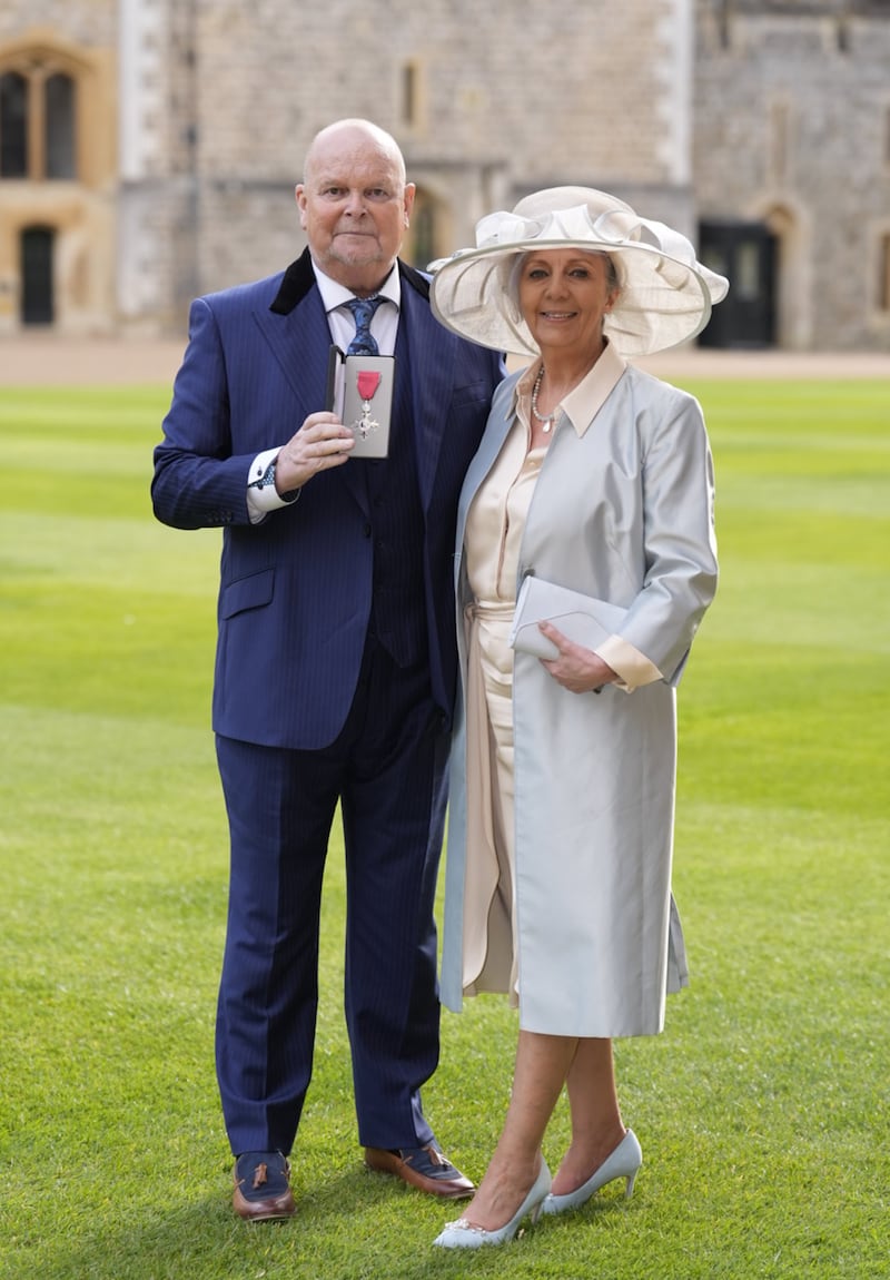 James Whale, with his wife Nadine, was made an MBE at Windsor Castle