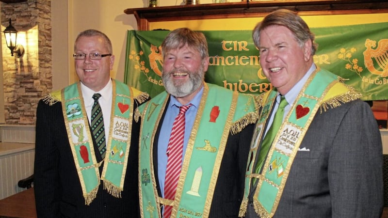Republican Gerry McGeough has been re-elected as president of the AOH in Co Tyrone. Here he is pictured with prominent US AOH members Judge Jim McKay III and Dan O&#39;Connell. 