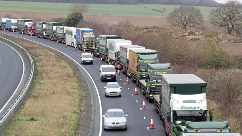 Lorries form up on the A256 outside Dover earlier this month for the second of two trials at the former Manston Airport site in Kent of a government plan to hold lorries in the event of post-Brexit disruption at the channel ports. Picture by Gareth Fuller, Press Association 