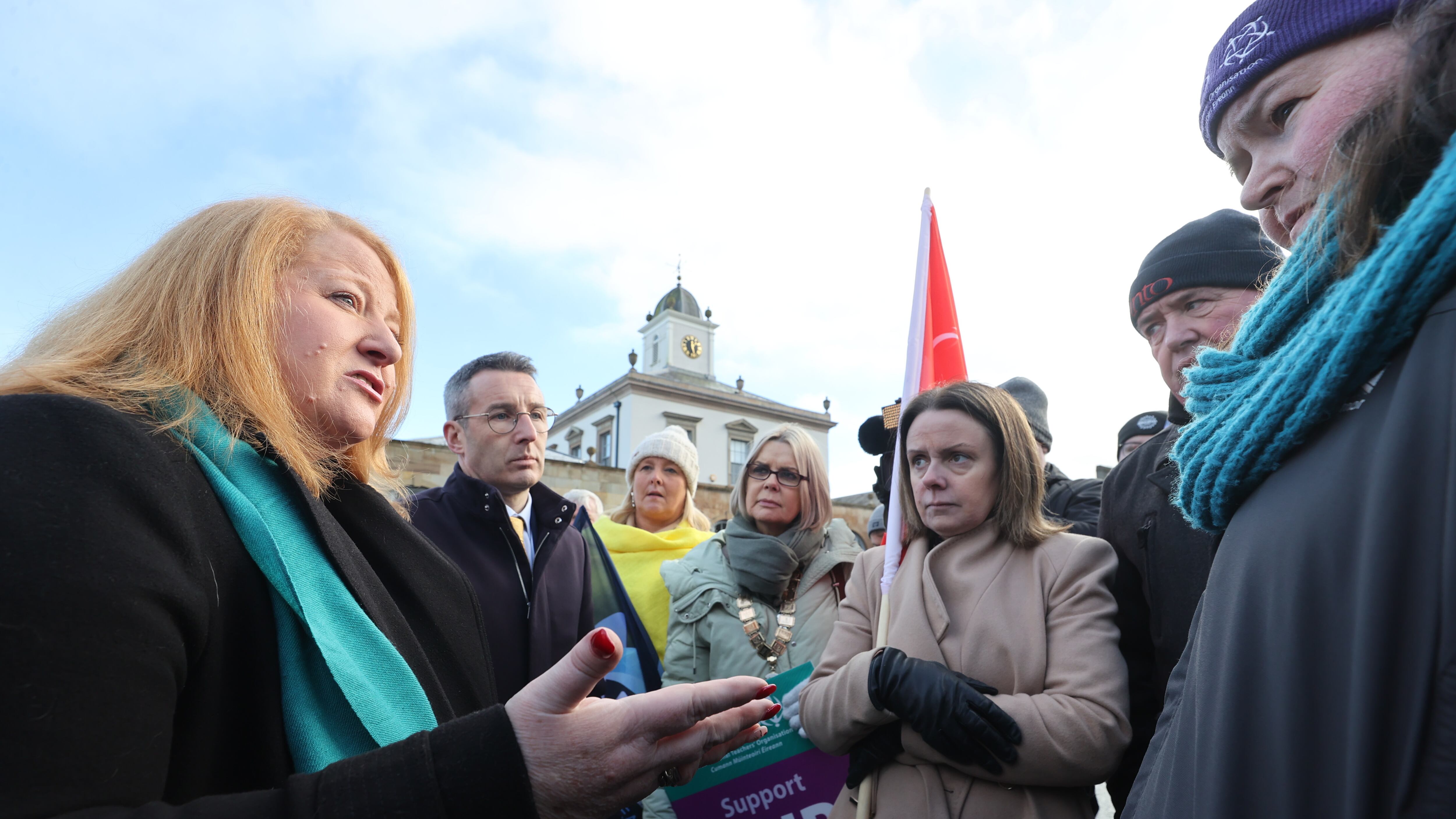 Alliance Party leader Naomi Long (left) with party colleague Andrew Muir (2nd left) speak to representatives from teachers unions as they protest outside Hillsborough Castle, before meeting Northern Ireland Secretary Chris Heaton-Harris as he meets political parties over the Stormont stalemate
