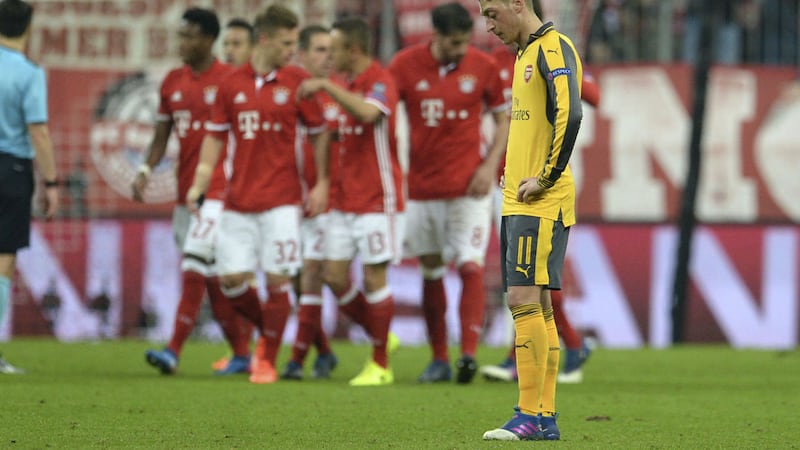 <span style="font-family: Verdana, Arial, Helvetica, sans-serif; font-size: 13.3333px;">Arsenal's Mesut Ozil looks disappointed after Bayern scored their fifth goal in Munich</span>