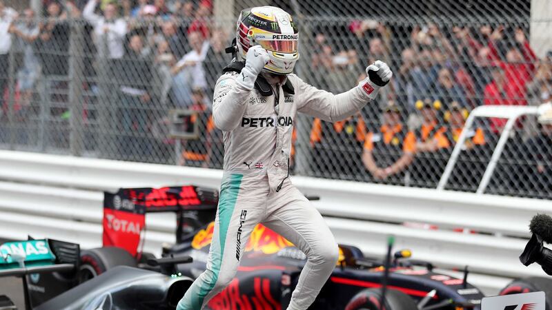 Mercedes' Lewis Hamilton celebrates his victory in the Monaco Grand Prix at the Circuit de Monaco on Sunday<br />Picture by AP&nbsp;