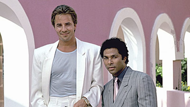 Don Johnson in a rare &#39;sleeves down&#39; moment with on-screen Miami Vice partner Philip Michael Thomas 