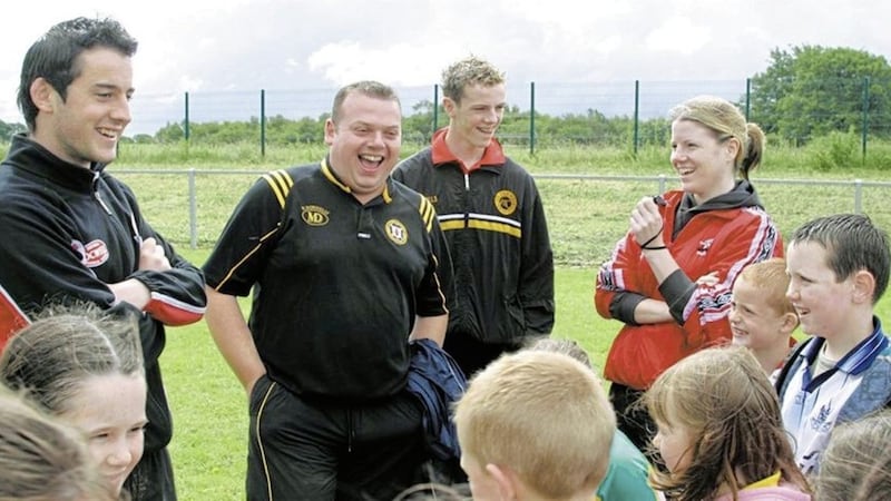 Tyrone trainer Fergal McCann (centre), sadly passed away last night after a long illness 