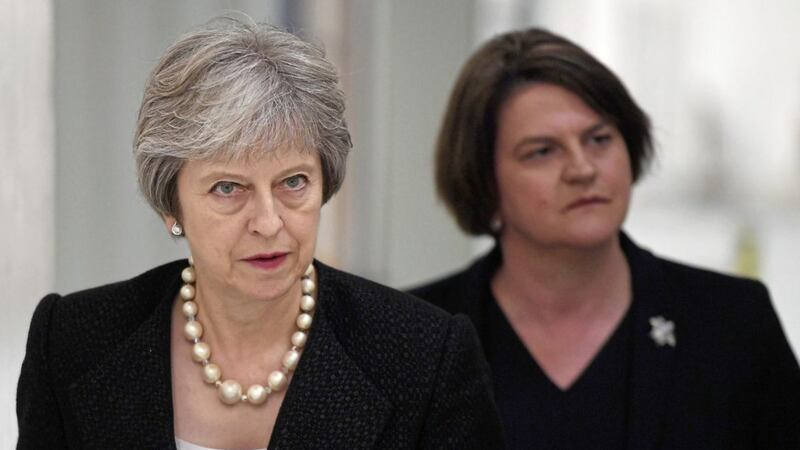 British prime minister Theresa May (left) relies on support from Arlene Foster's DUP MPs