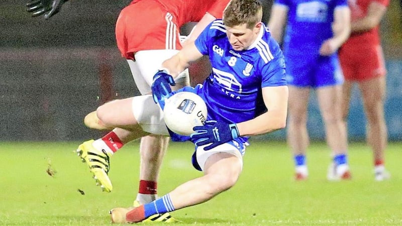 Tyrone Frank Burns tangles with Monaghan&#39;s Darren Hughes last Saturday night Picture: Philip Walsh. 