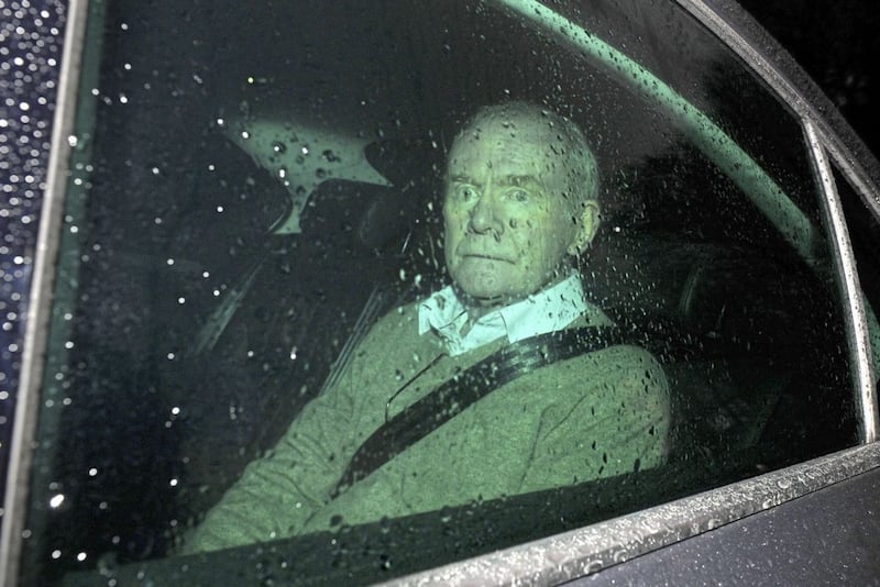 Martin McGuinness leaving Stormont Castle in his car after resigning as Deputy First Minister. Picture by Mal McCann 