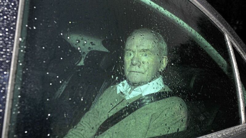 Martin McGuinness leaving Stormont Castle in his car after resigning as Deputy First Minister. Picture by Mal McCann 