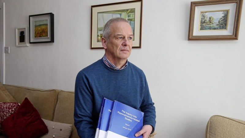 Alan Roberts with a copy of the report into Hyponatraemia deaths. Picture Mal McCann. 