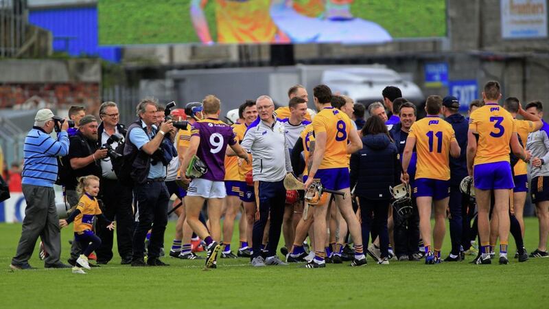 Clare manager Brian Lohan celebrates with his players after Saturday&#39;s All-Ireland SHC quarter-final win over Wexford at Semple Stadium Picture: Seamus Loughran. 