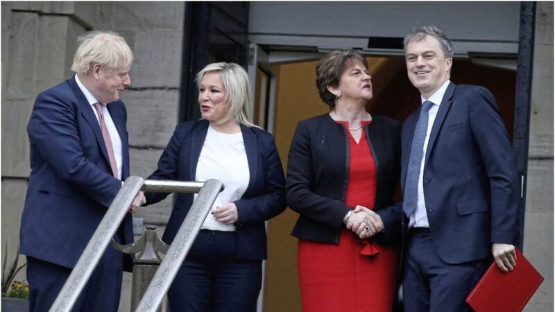 Boris Johnson is greeted by the first and deputy first ministers Arlene Foster and Michelle O&#39;Neill and Secretary of State Julian Smith. Picture by Hugh Russell 