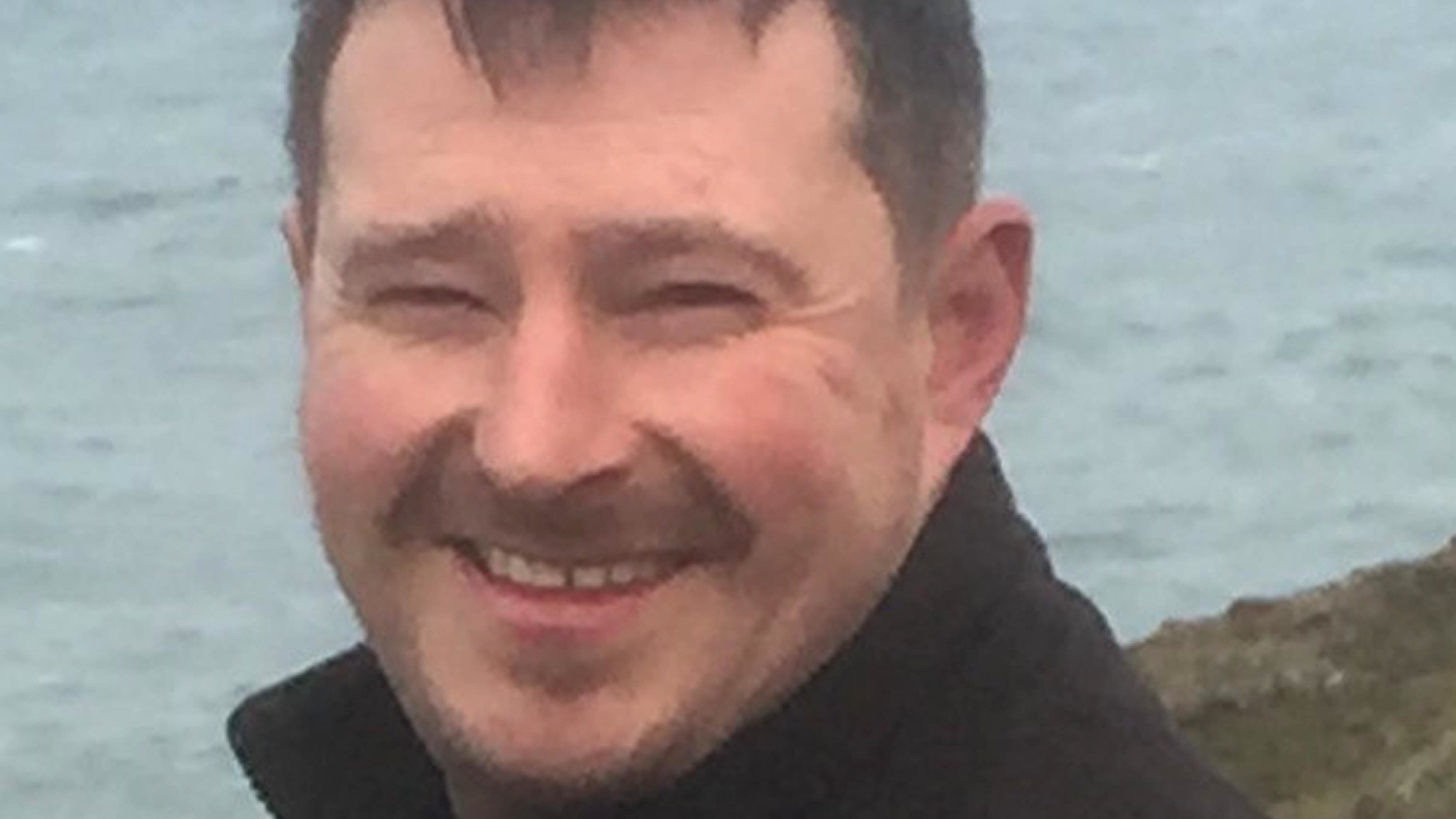 Hywel Morgan died after rescuing a group of children caught in a riptide