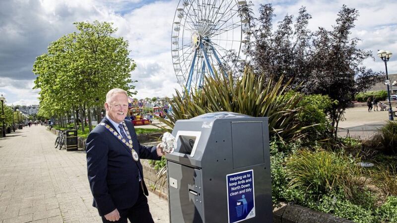 Mayor Trevor Cummings with one of the new solar-powered compacting bins in Bangor. Picture by Graham Baalham-Curry 